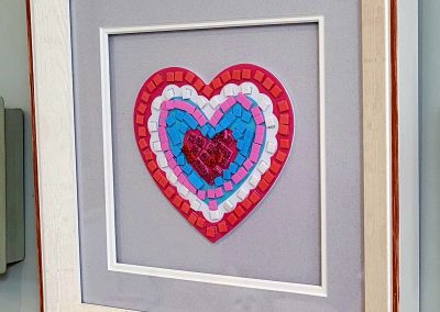 My 81yr old mum made this heart at Age UK. This was one of the first pieces we framed. She loves it.
