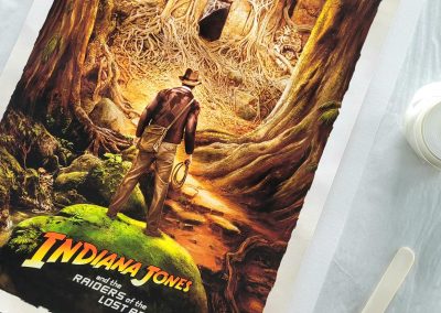 A ltd edition Indianna Jones print. This has been prepped for float framing using the "bridge and anchor" hinging method.